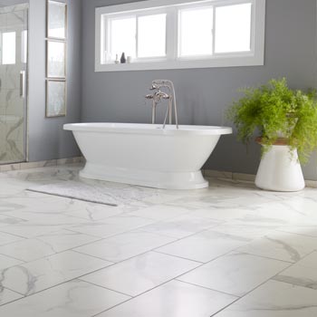 white and grey tile flooring in bathroom